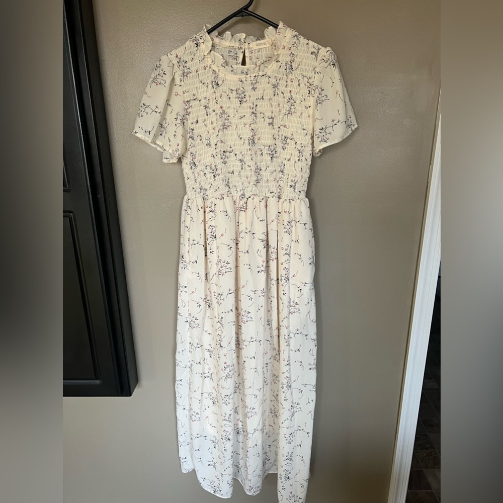 Roolee floral maxi dress with ruched bodice.